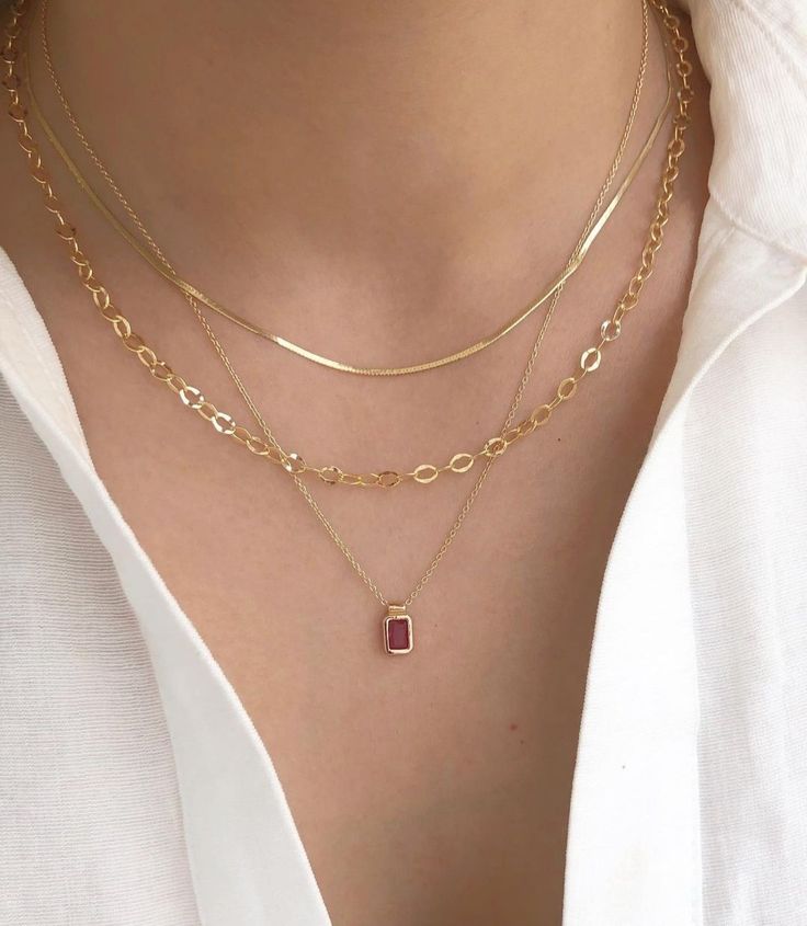Layered minimalist jewelry look